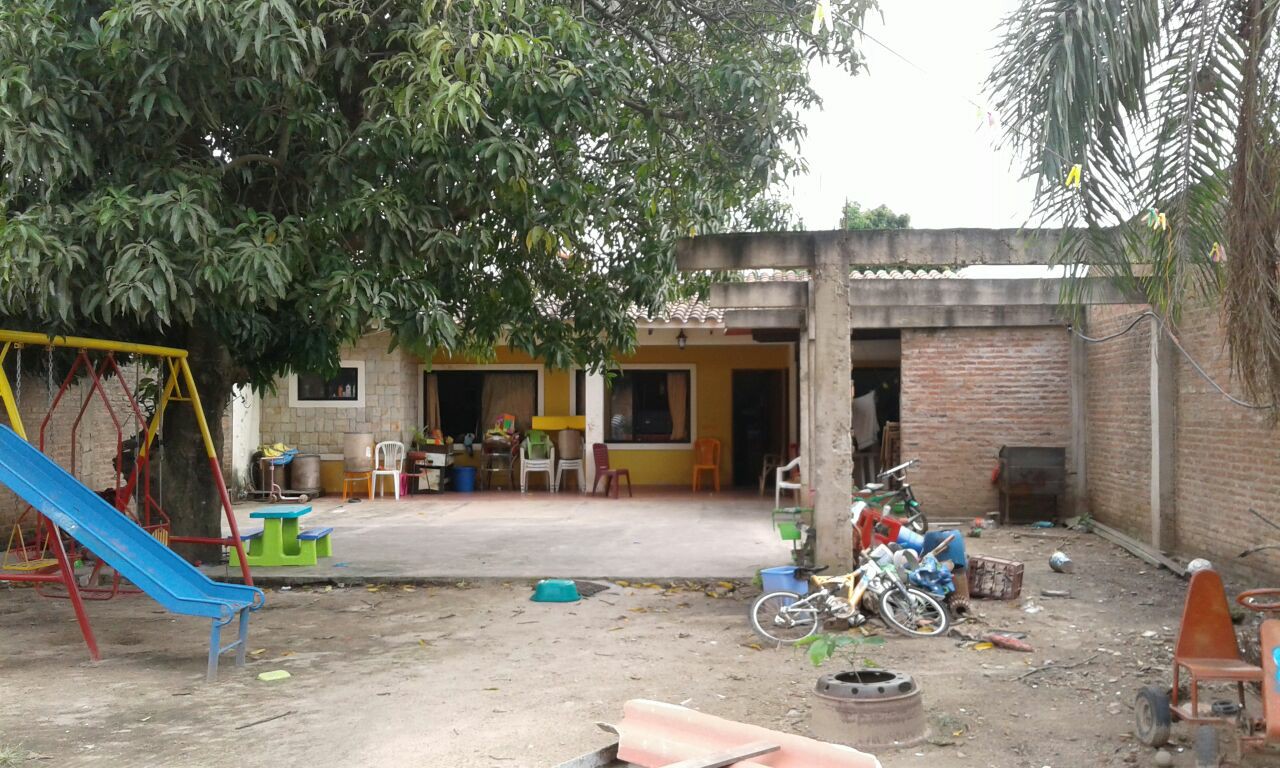 Casa Barrio 23 de diciembre calle total #206 Foto 1