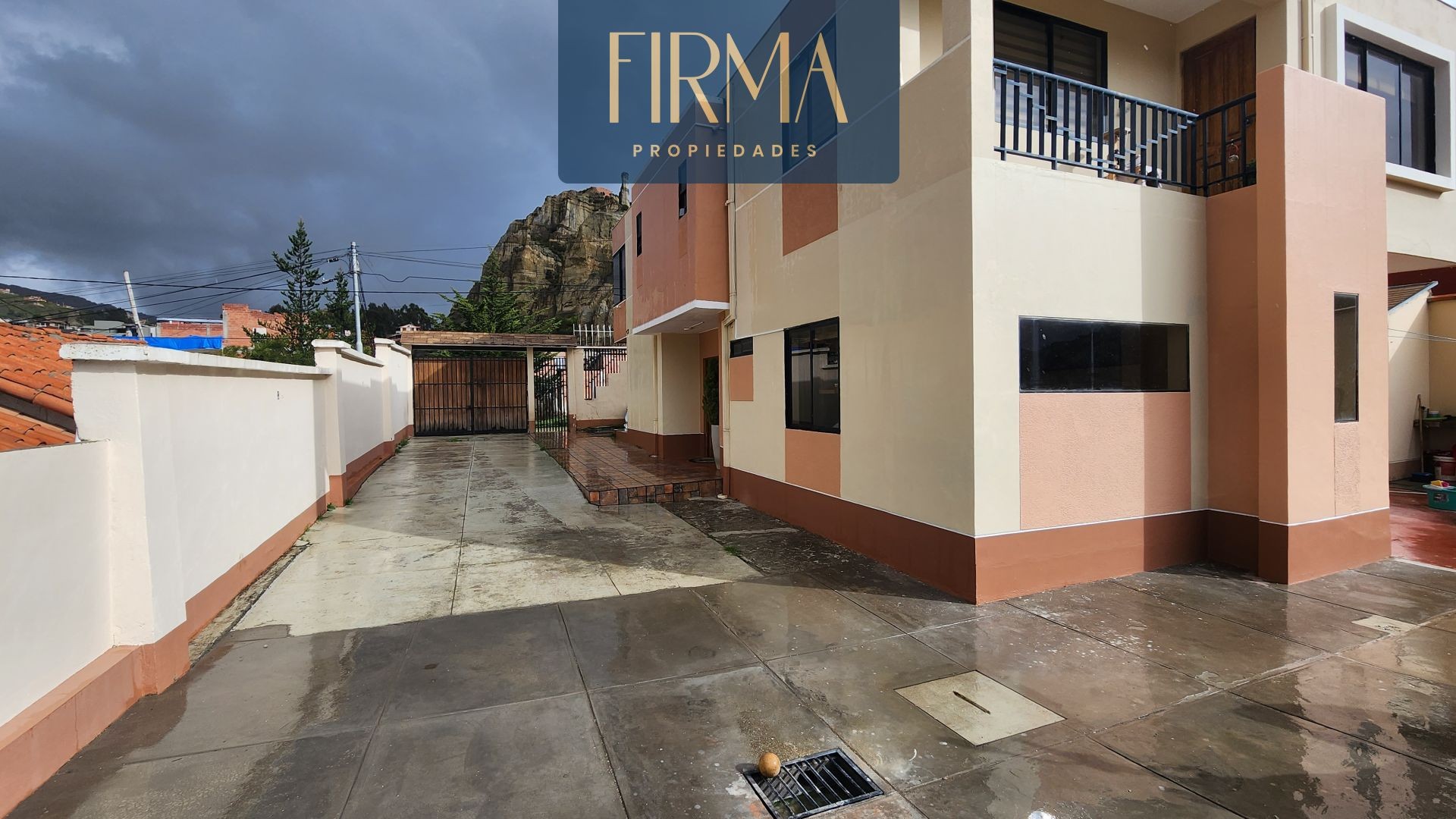 Casa en AnticréticoCASA EN ANTICRETICO REGISTRABLE, ACHUMANI 3 dormitorios 4 baños 3 parqueos Foto 1