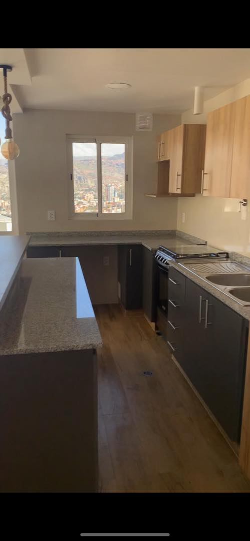 Departamento en AlquilerCota Cota, Urbanización la glorieta final calle A (principal) N 108. Frente a Santorini, Edificio blanco Foto 15